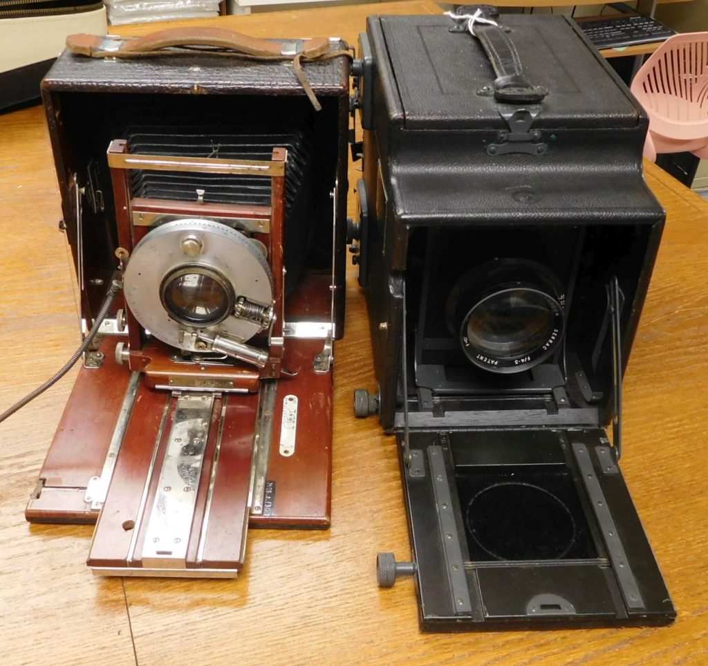 left:Korona V by Gundlach Optical Company, New York, 5 X 7" glass plate camera right: J. H. Dallmeyer, Britain, single lens reflex box camera. *