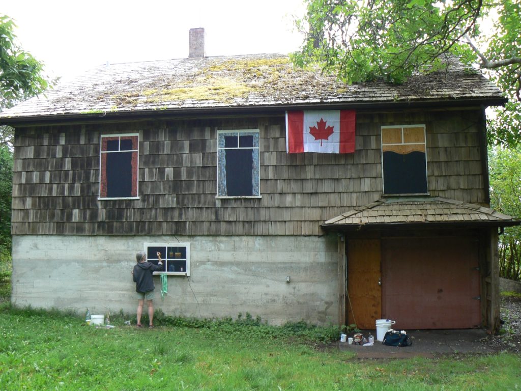 Shakesides back art on boarded windows, July 2016