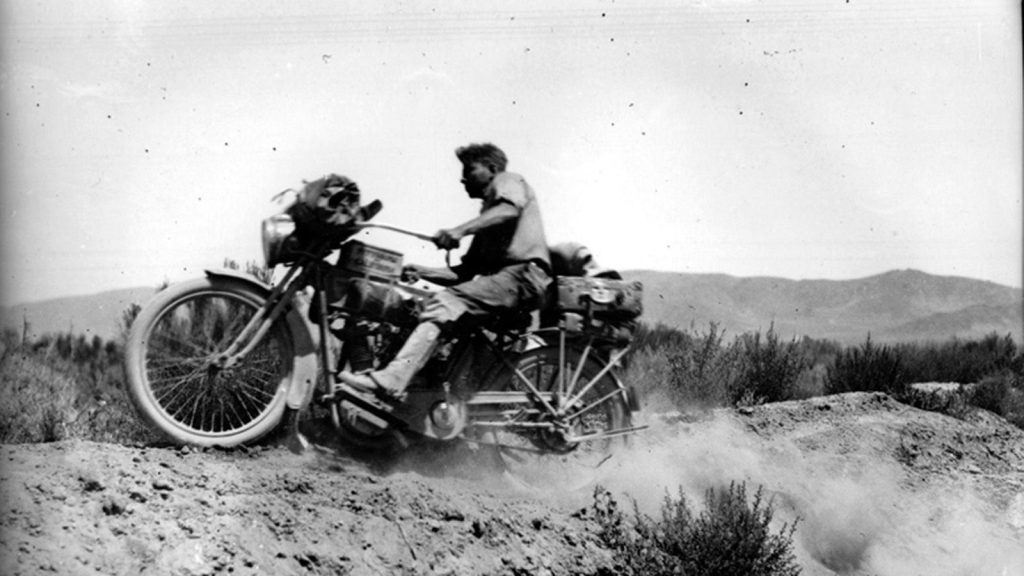 Laing on his motorcycle on cross country trip, 1915