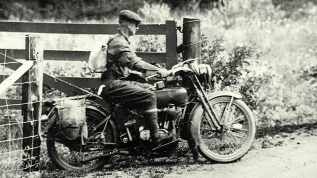 Laing on his loaded motorcycle, 1915