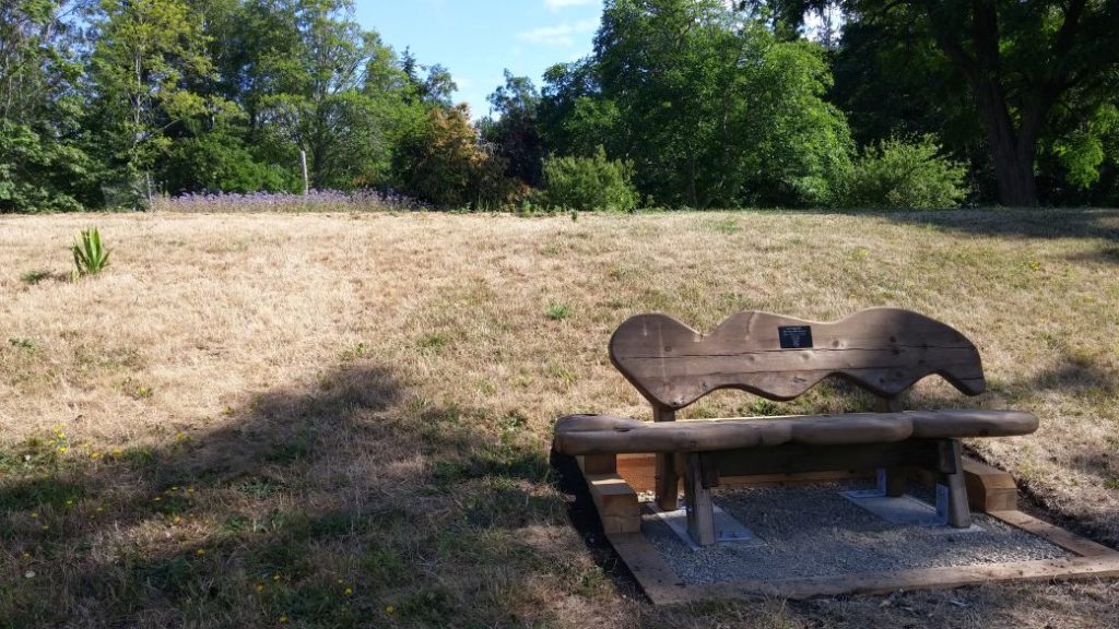 Memorial bench below former house site